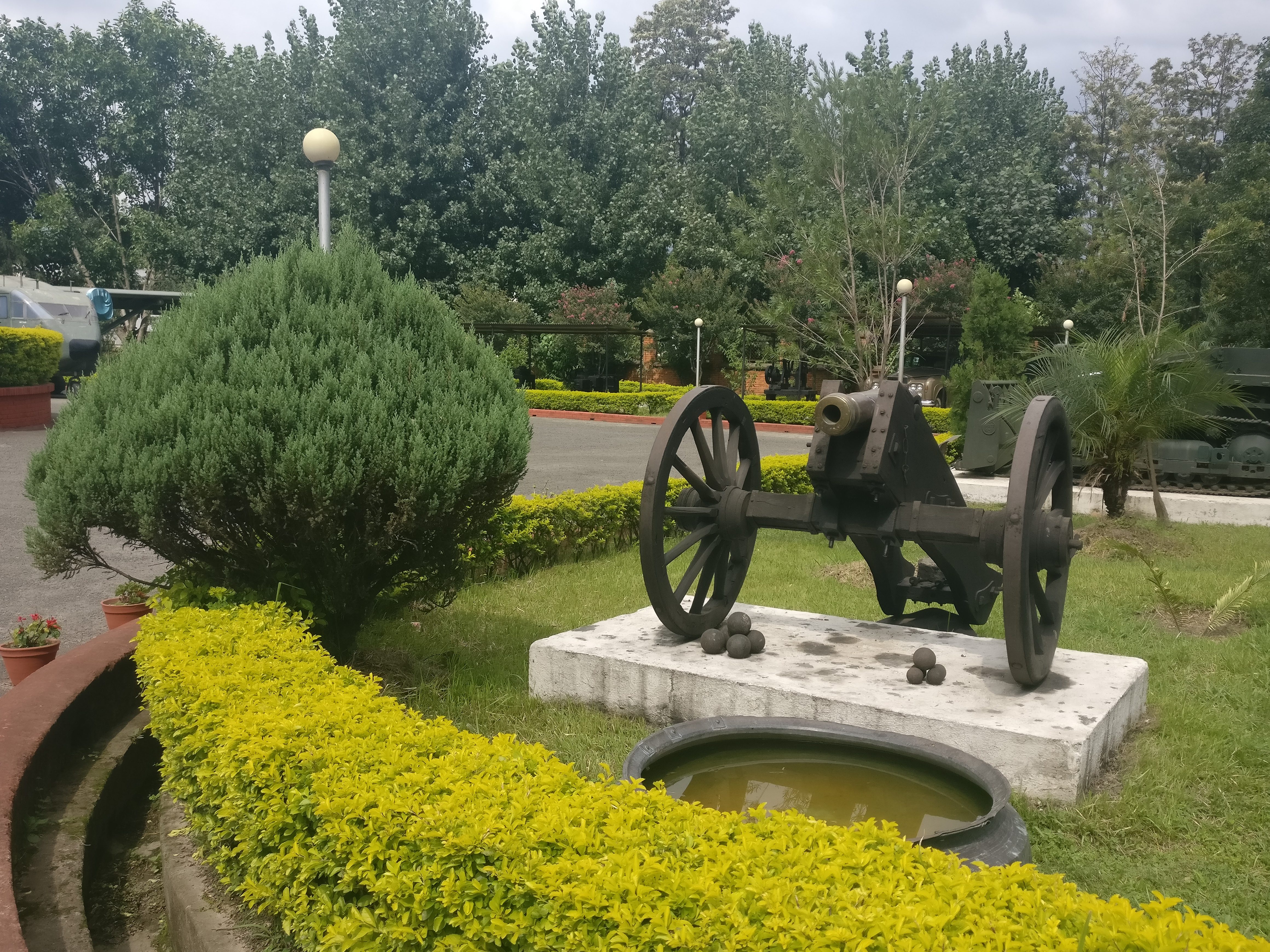 Cannon and cannonballs on display outside